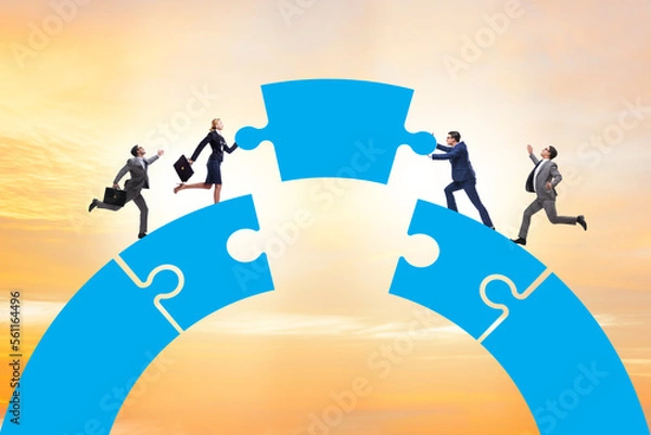 Obraz Business people building bridge in teamwork concept