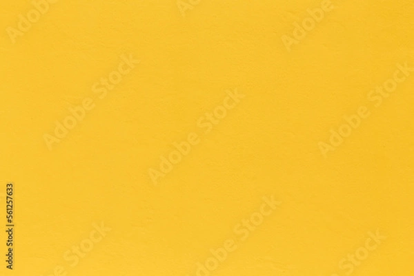 Fototapeta pattern of bright yellow painted old plaster wall