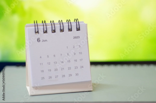 Fototapeta White calendar on green background.