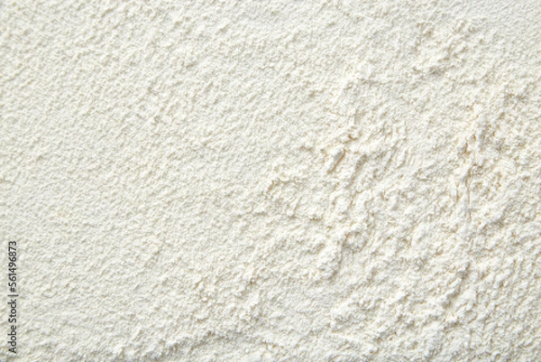 Obraz Flour close up background. A pile of flour on a white background. Spilled flour. Flour texture