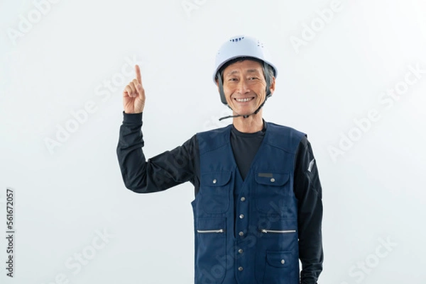 Fototapeta 上を指さす職人