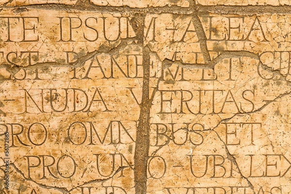 Obraz Cracked wall with Latin inscriptions and Roman letters