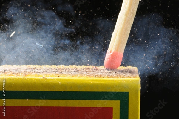 Fototapeta Striking a match
