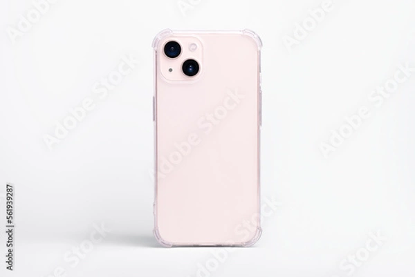 Fototapeta Pink iPhone 13 in clear transparent soft silicone case back view. Phone case mockup isolated on gray background