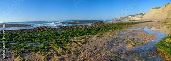 Fototapeta Magoito Beach, beautiful sandy beach on Sintra coast, during low tide, Lisbon district, Portugal, part of Sintra-Cascais Natural Park with natural points of interest