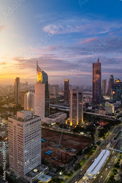 Fototapeta Jakarta Panoramic from Sudirman street view during the golden hour. Jakarta is capital city of indonesia before it be moved to Kalimantan. 