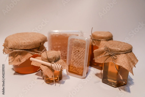 Obraz Collection of honey jars and pots mocked up for labelling
