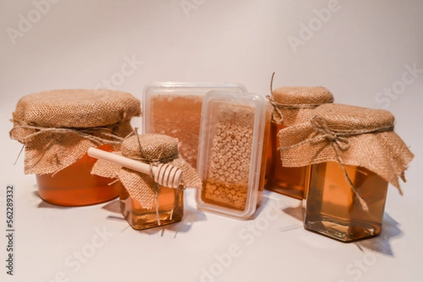 Obraz Collection of honey jars and pots mocked up for labelling
