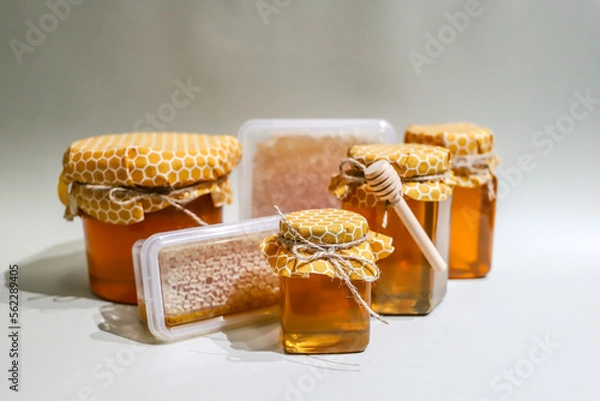 Fototapeta Collection of honey jars and pots mocked up for labelling