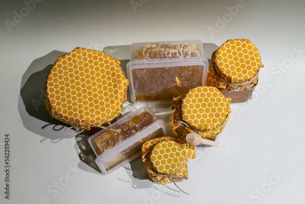 Obraz Collection of honey jars and pots mocked up for labelling