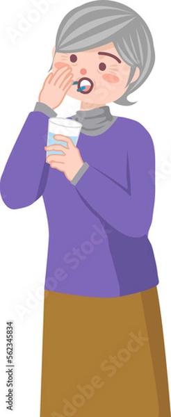 Fototapeta 薬を飲むシニア女性