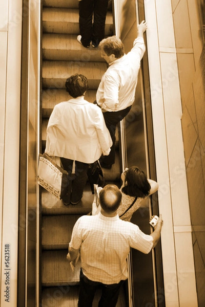 Obraz People ascending escalators and stairs..