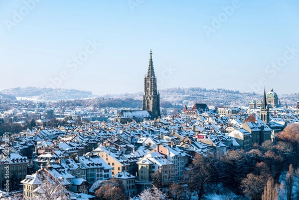 Fototapeta View of the city of Bern with a cathedral on a sunny winter day in Switzerland.