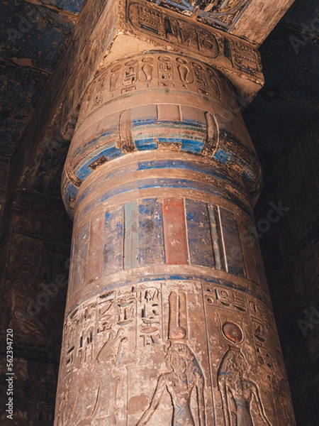 Fototapeta Colourful column with hieroglyphs in Habu Temple, Luxor, Egypt.