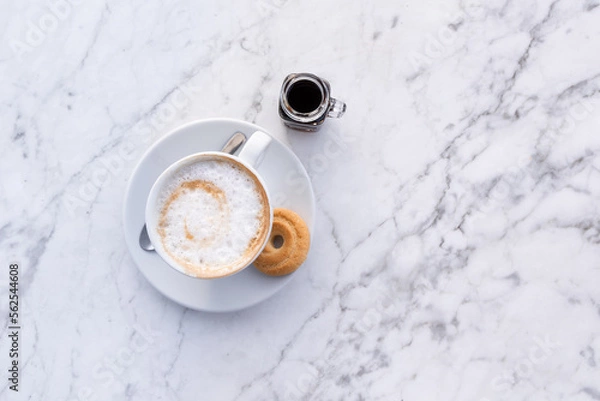 Obraz Cappuccino cup and biscotti top down view, italian coffee, cafe.