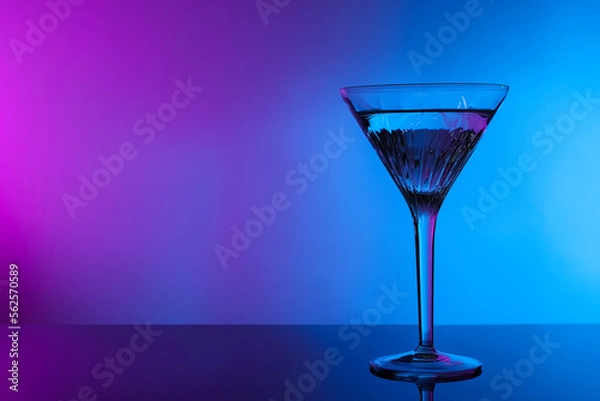 Fototapeta Fresh martini on table in neon lights, space for text