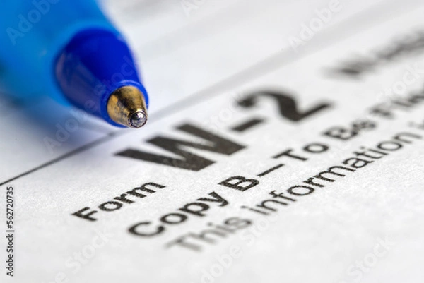 Fototapeta Detail close up of tax return filing form W-2