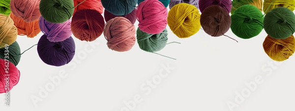 Fototapeta Balls of wool colored yarn for hand knitting and crochet on white background. Recomforting winter hobby concept. Mock up, flat lay, copy space, banner.