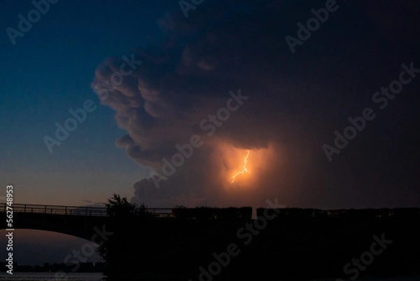 Obraz Lightning bolt in clouds before storm