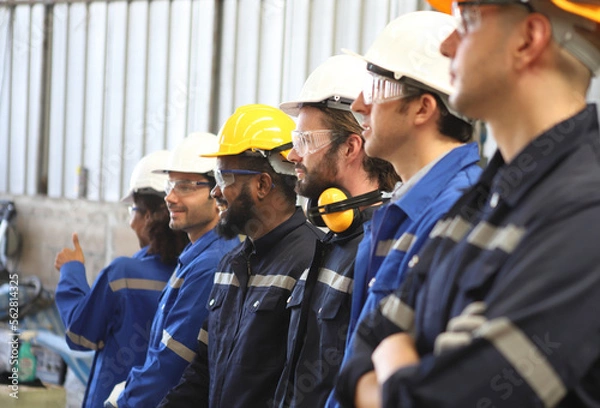 Obraz engineer team standing at industry