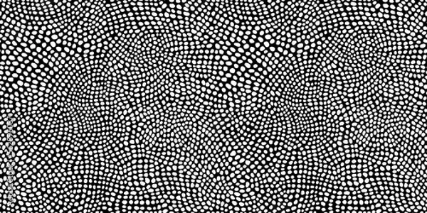 Obraz Seamless hand drawn small dense polkadot animal spots pattern in white on black background. Abstract aboriginal dot art motif or organic cellular texture in a trendy doodle line art or linocut style.