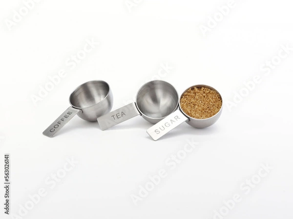 Obraz measuring cups and brown sugar