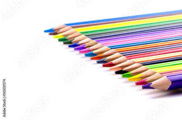 Fototapeta A set of color pencils isolated on a white background. Copy space. A School stuff.Drawing supplies