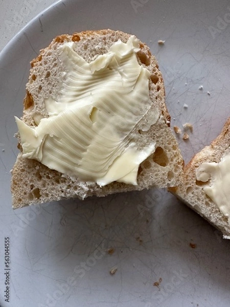 Fototapeta Sandwich with butter. Bread and butter, homemade traditional sandwich. 