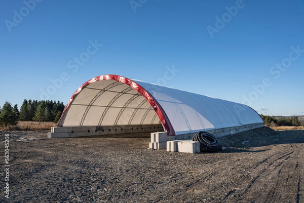 Obraz Constuction of a commercial fabric dome. Hoop building. Canvas. Fabric covered. Dome storage. Fabric building. Hoop building. Storage. Prefabricated. Commercial dome.  Dome. Fabric structure. 