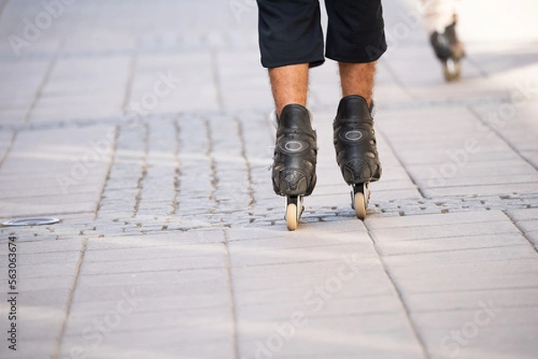 Fototapeta Close up of person with roller blades