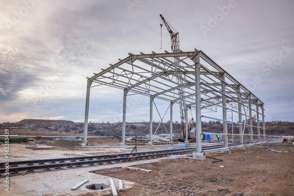 Fototapeta Construction of the metal frame of the wagon unloading station