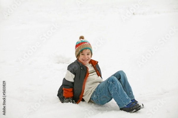 Fototapeta Boy Playing in the Snow