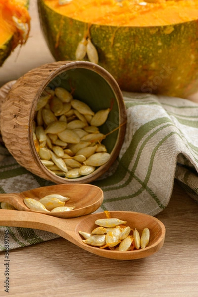 Obraz Pumpkins on a wooden background
