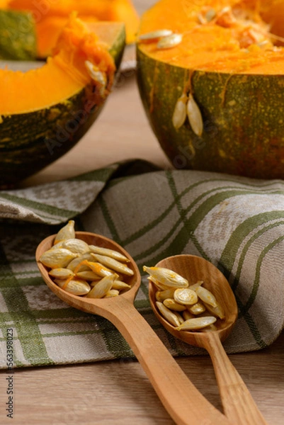 Obraz Pumpkins on a wooden background
