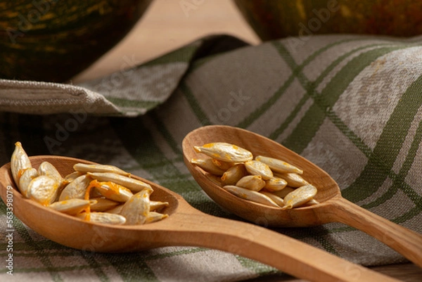 Obraz Pumpkins on a wooden background

