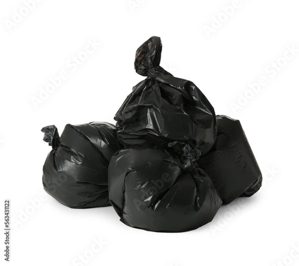 Fototapeta Trash bags full of garbage isolated on white