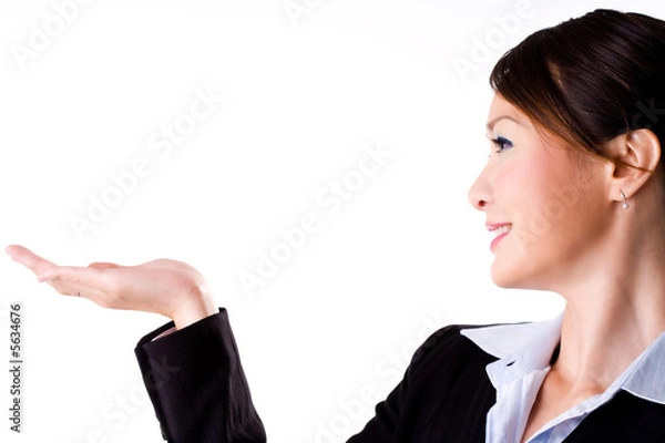 Fototapeta business woman smiling with an empty palm