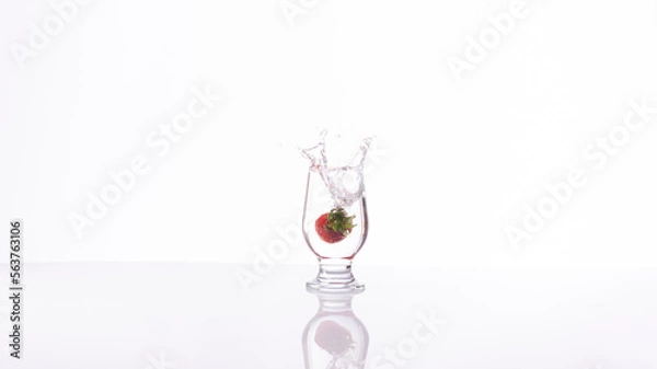 Obraz Strawberry drink explosion with white background