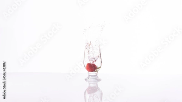 Obraz Strawberry drink explosion with white background