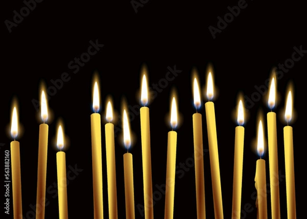 Fototapeta burning candles on a black background