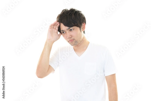 Fototapeta 思い悩む男性