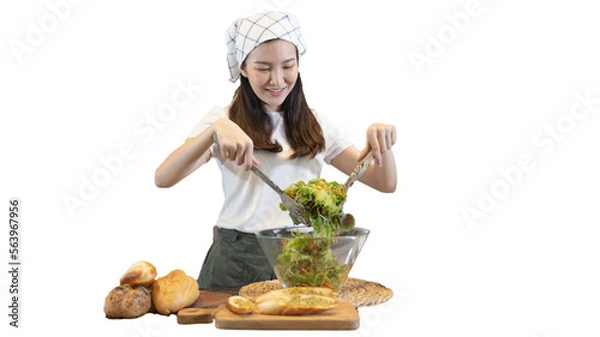 Fototapeta Asian woman making vegetable salad in her home kitchen, Vegetables contain a wide variety of vitamins and minerals, High-fiber and low-calorie diets, Healthy vegetable salad idea, Appetizer concept.