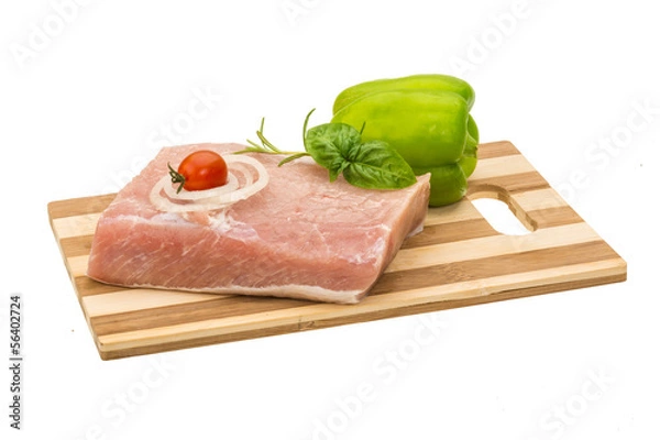 Fototapeta Raw pork with onion, basil and rosemary
