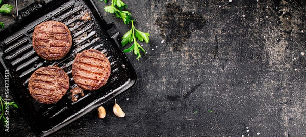 Obraz Grilled burger in a frying pan. 