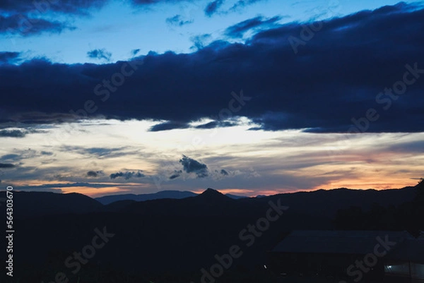 Fototapeta morning scene of hills, clouds and peaceful sunrise sky background in Da Lat highland, Vietnam