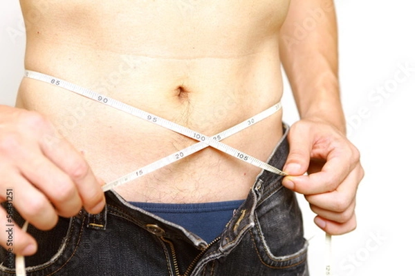 Fototapeta ウエストを測る男性