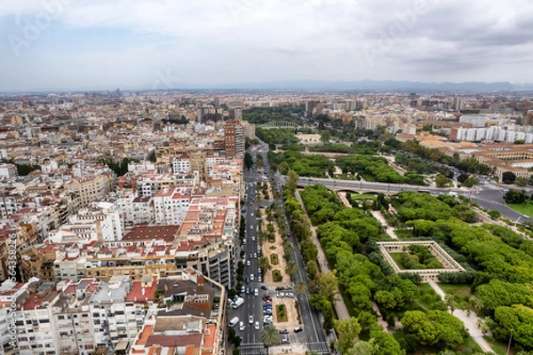Fototapeta Aerial drone view of sunrise over Turia Gardens, a riverbed turned into a park, in Valencia, Spain