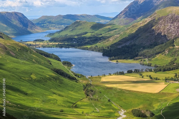 Fototapeta Hillside view over Buttermere and Crummock water with the Solway Firth in the background