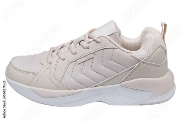Obraz Leather beige sports shoes for casual walks and for running, on a white background, isolate