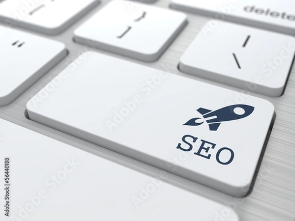 Obraz Biała klawiatura z przyciskiem SEO.